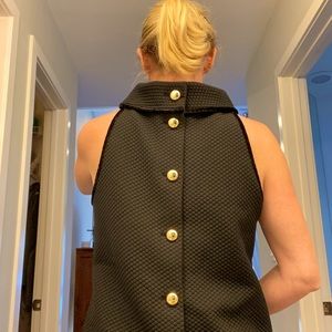 Black cowl neck sleeveless top. Gold buttons on back. Excellent condition